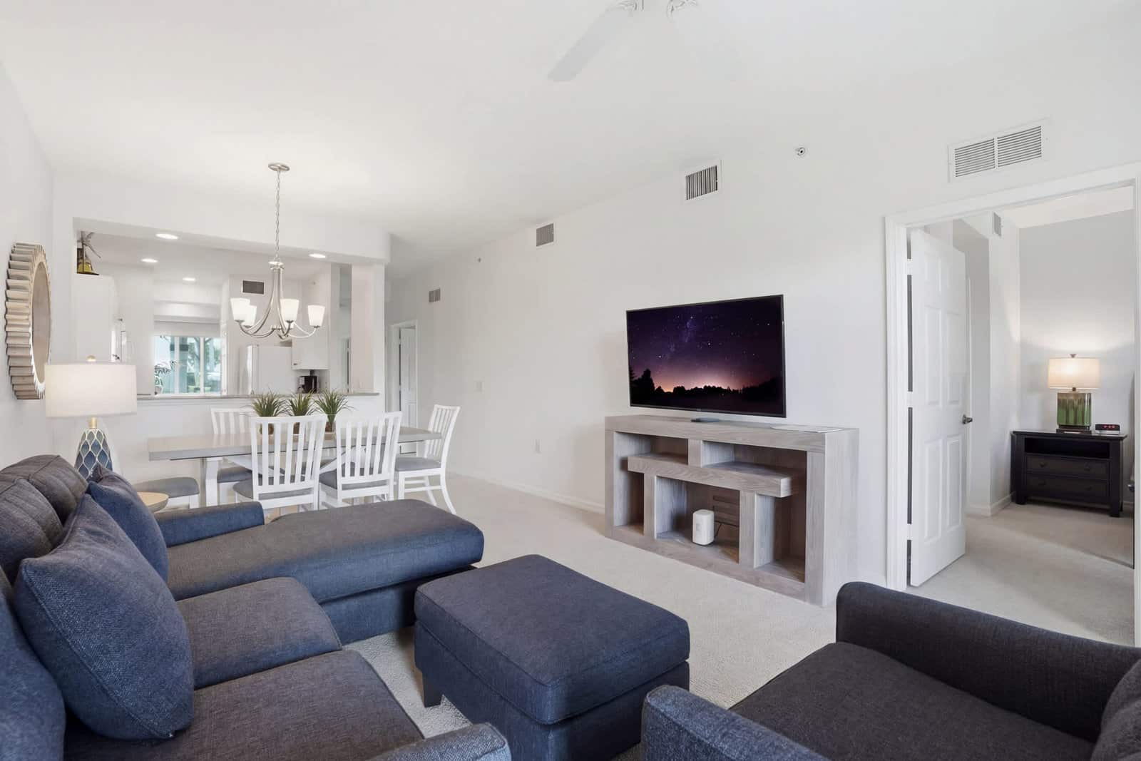 Open-plan living and dining area in a Southwest Florida resort villa